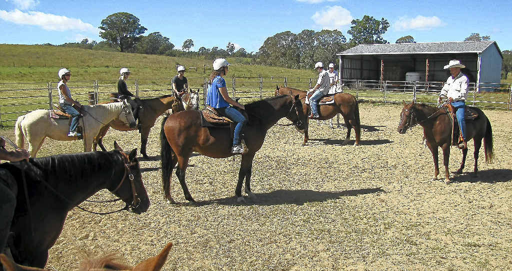 BEST HOOF FORWARD: Peter and Gill Gould issue instructions to the mostly novice adult riders. BEST HOOF FORWARD: Peter and Gill Gould issue instructions to the mostly novice adult riders.